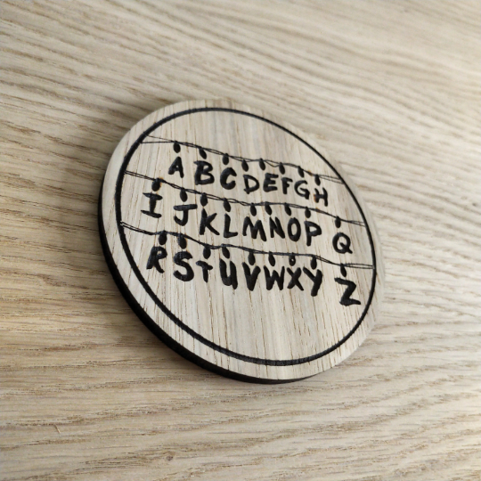 Laser cut wooden coaster personalised. Alphabet lights