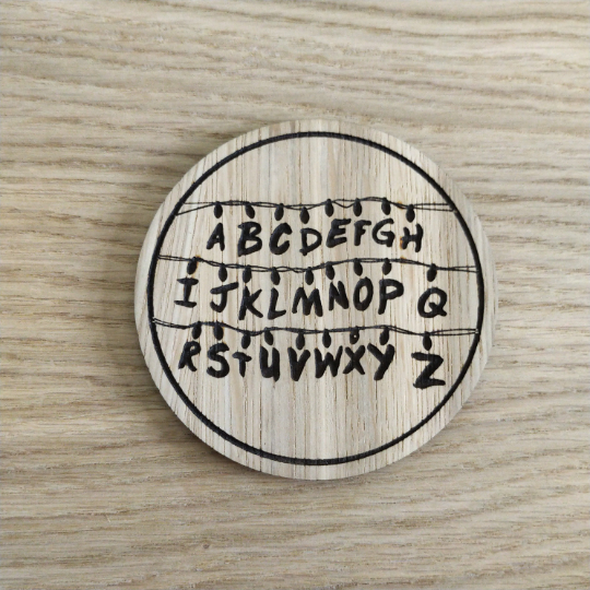 Laser cut wooden coaster personalised. Alphabet lights