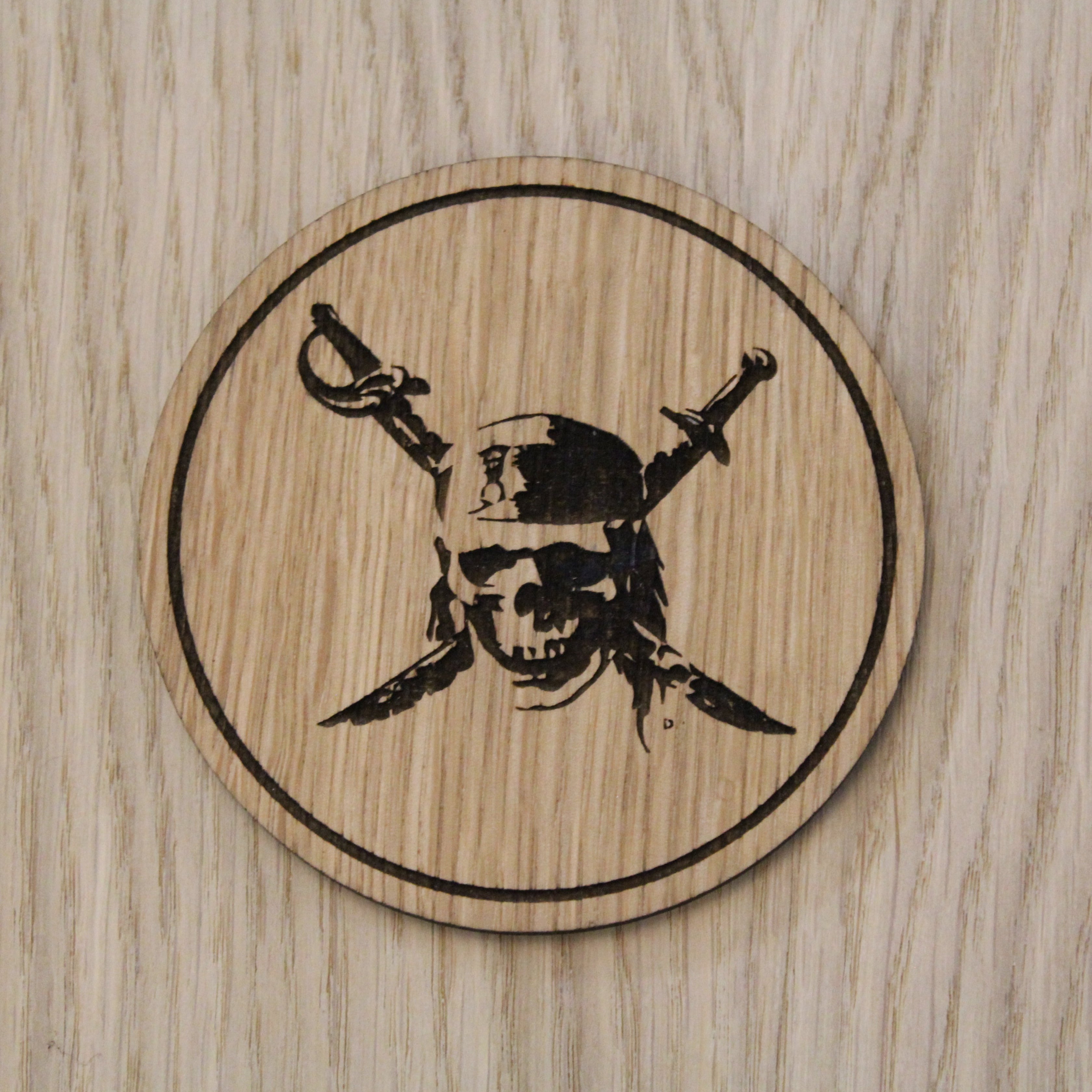 Laser cut wooden coaster. carribbean skull