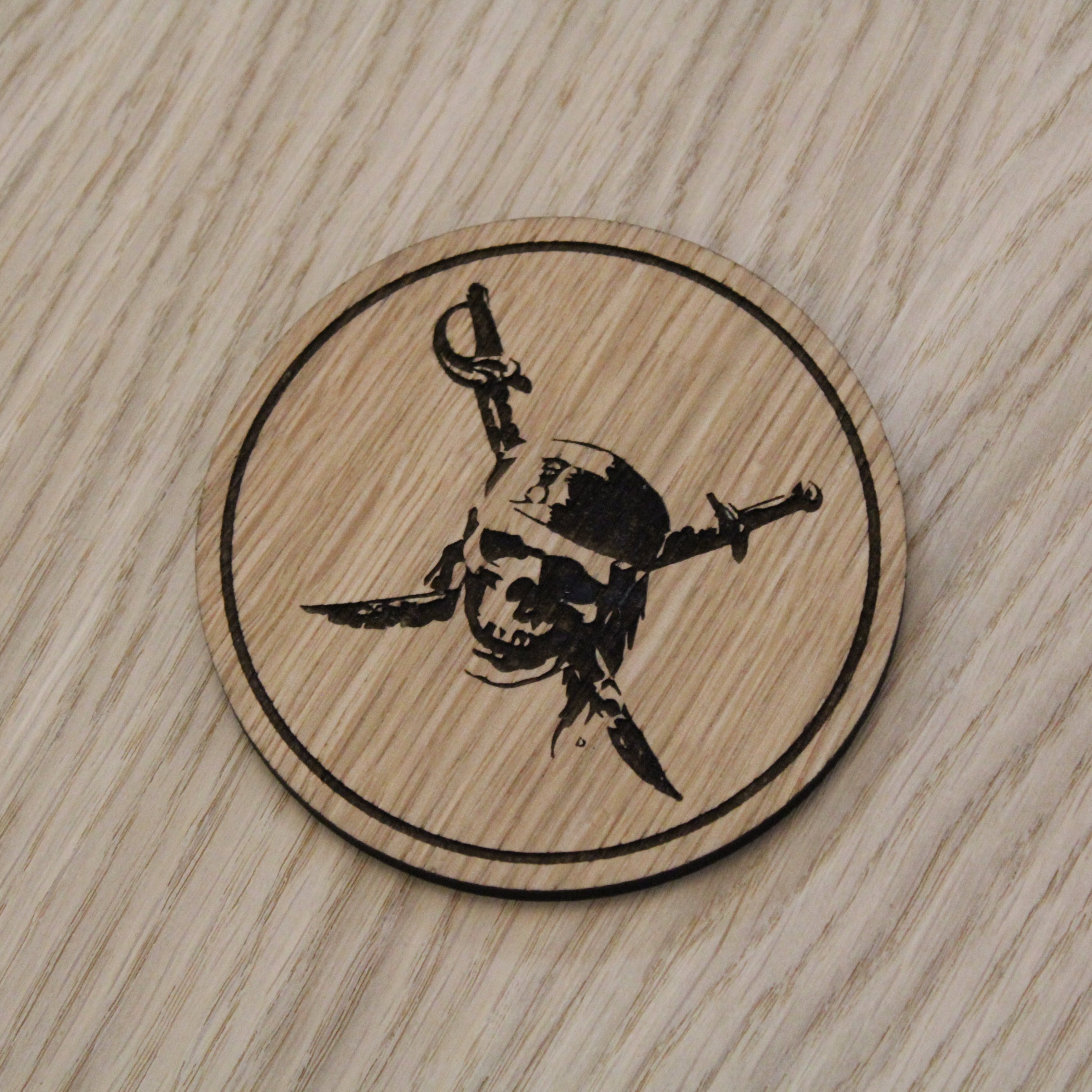 Laser cut wooden coaster. carribbean skull
