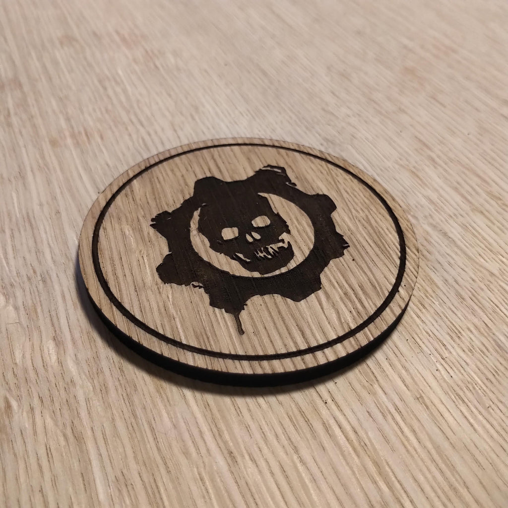 Laser cut wooden coaster. COG