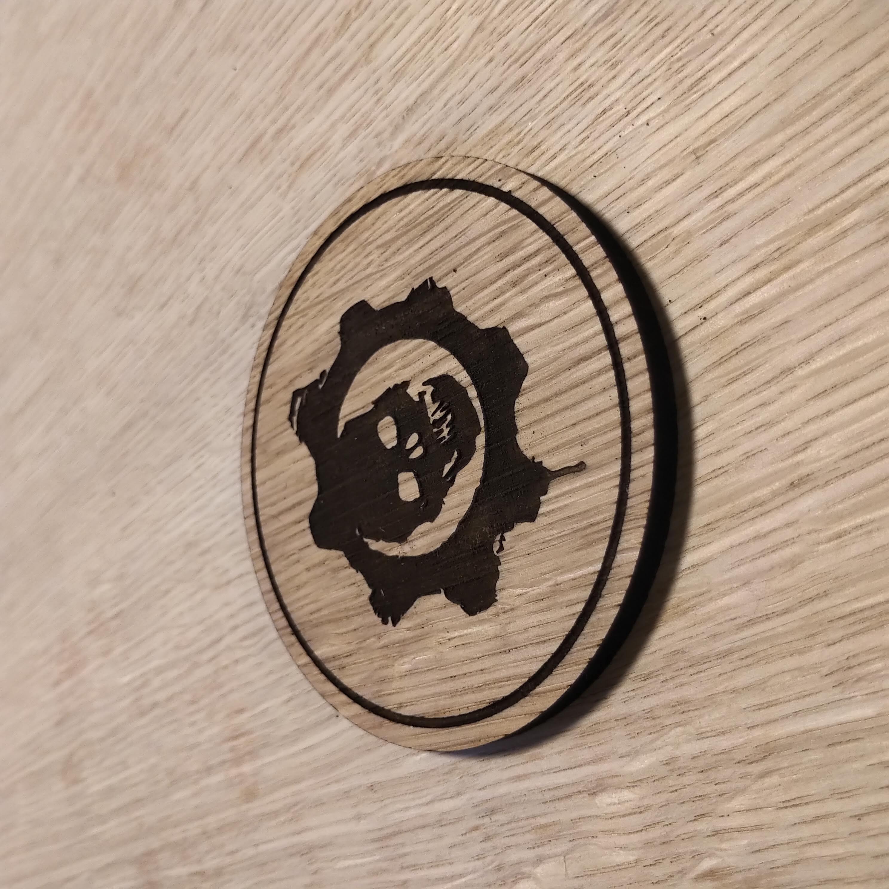Laser cut wooden coaster. COG