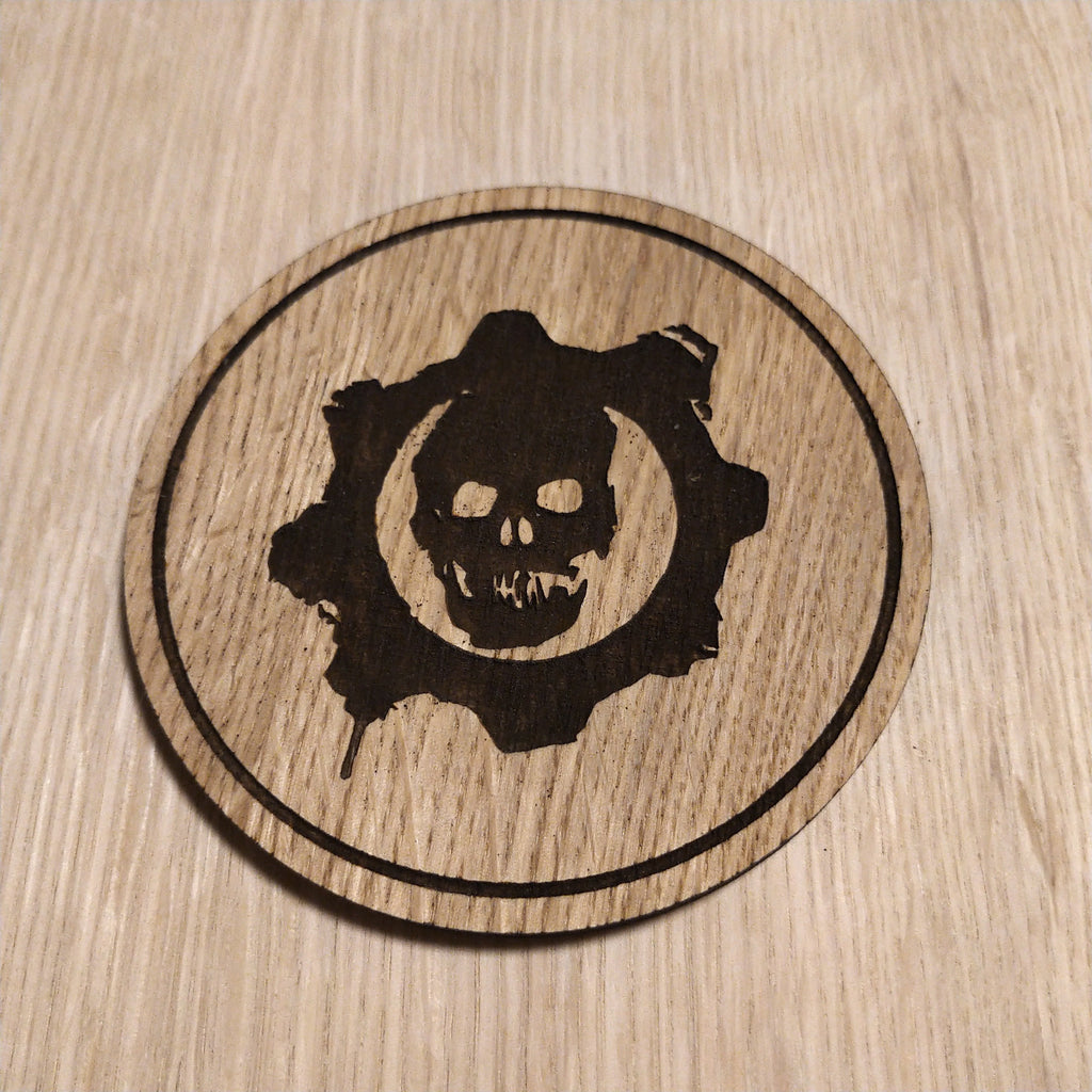Laser cut wooden coaster. COG