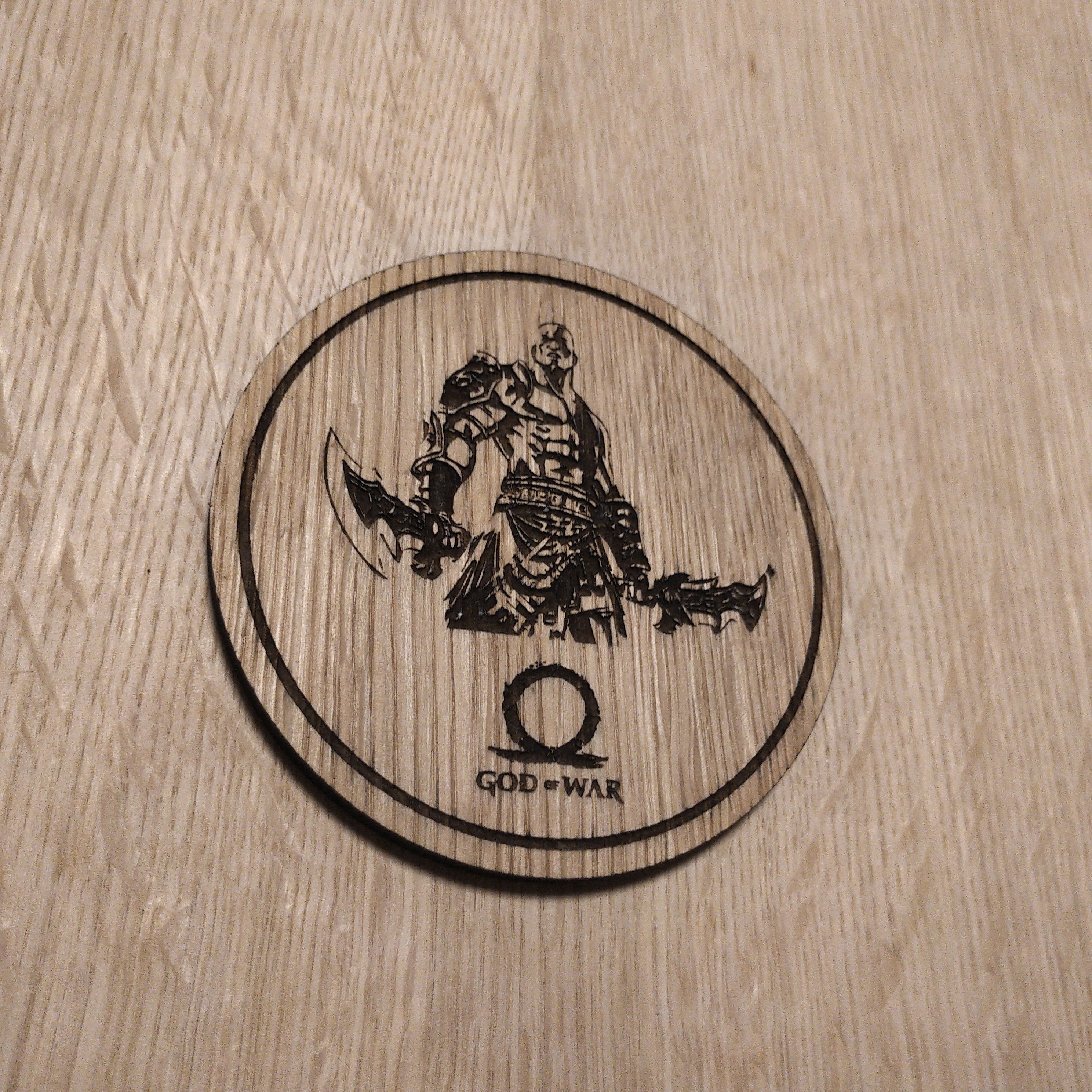 Laser cut wooden coaster. God of war Kratos