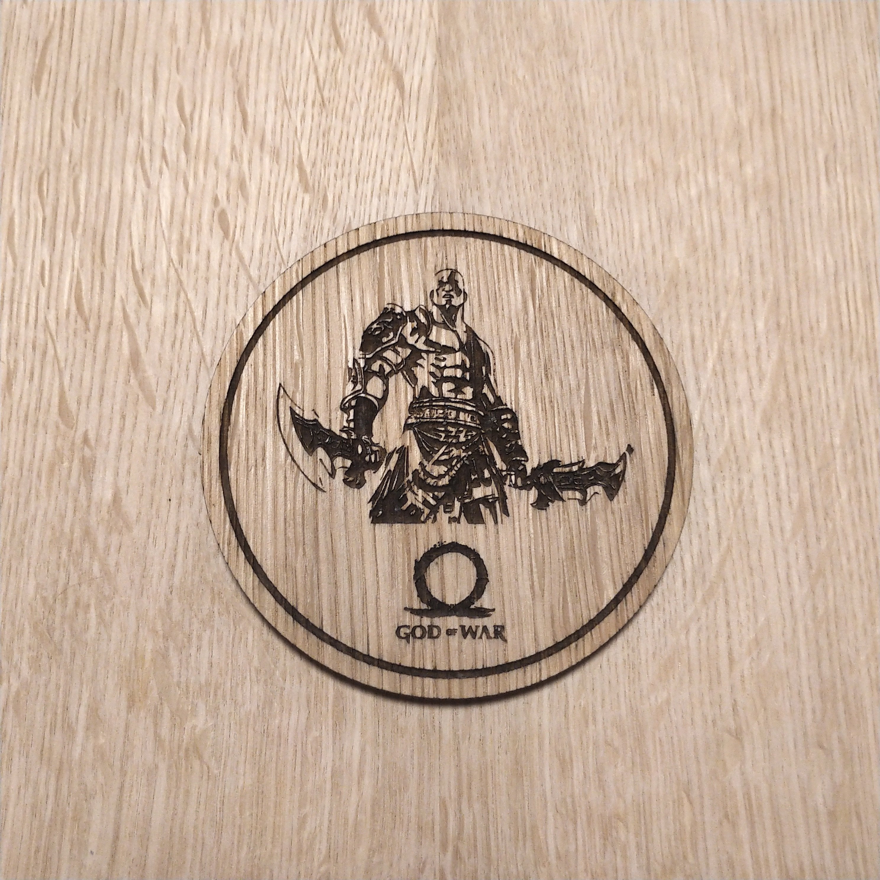 Laser cut wooden coaster. God of war Kratos