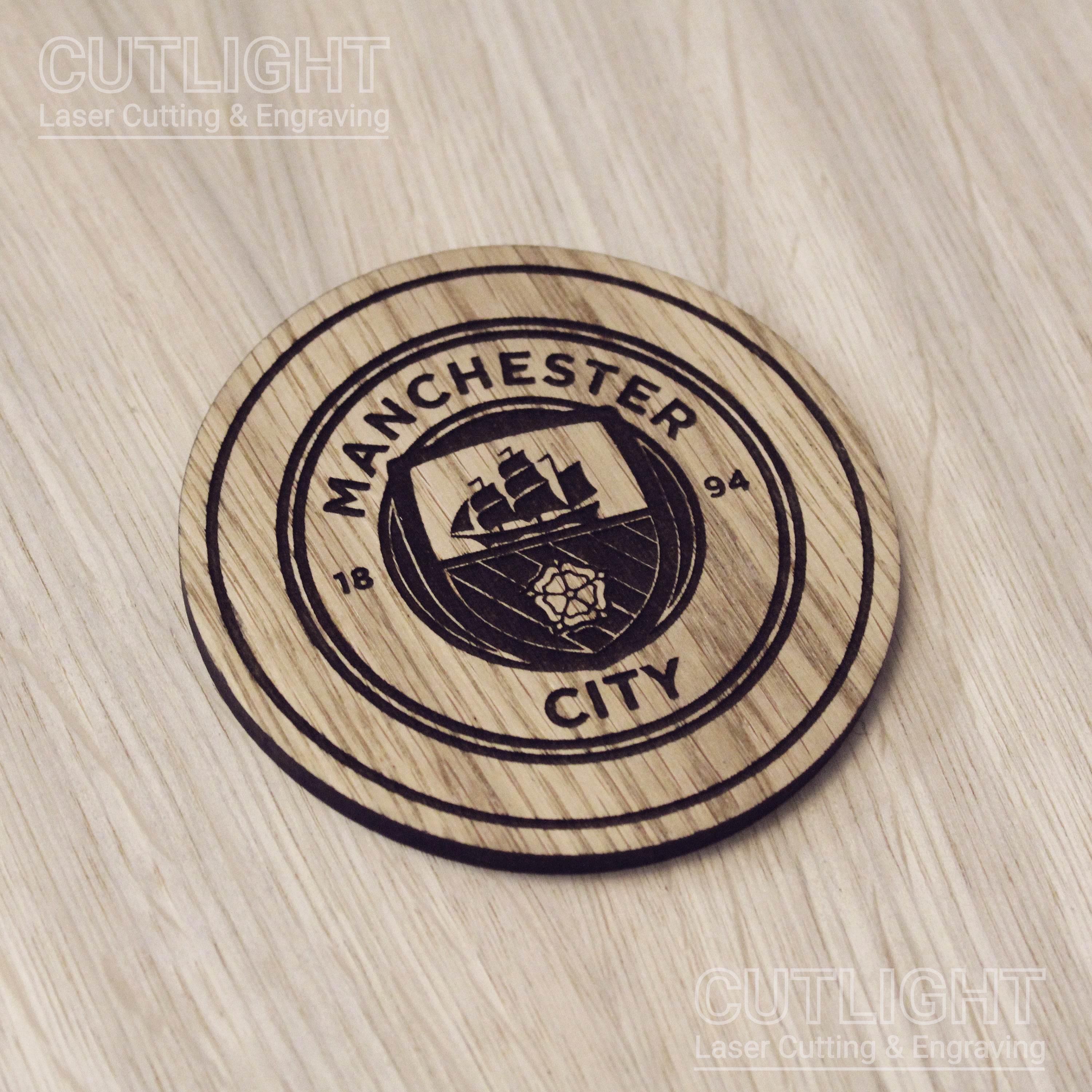 Laser cut wooden coaster. Manchester City