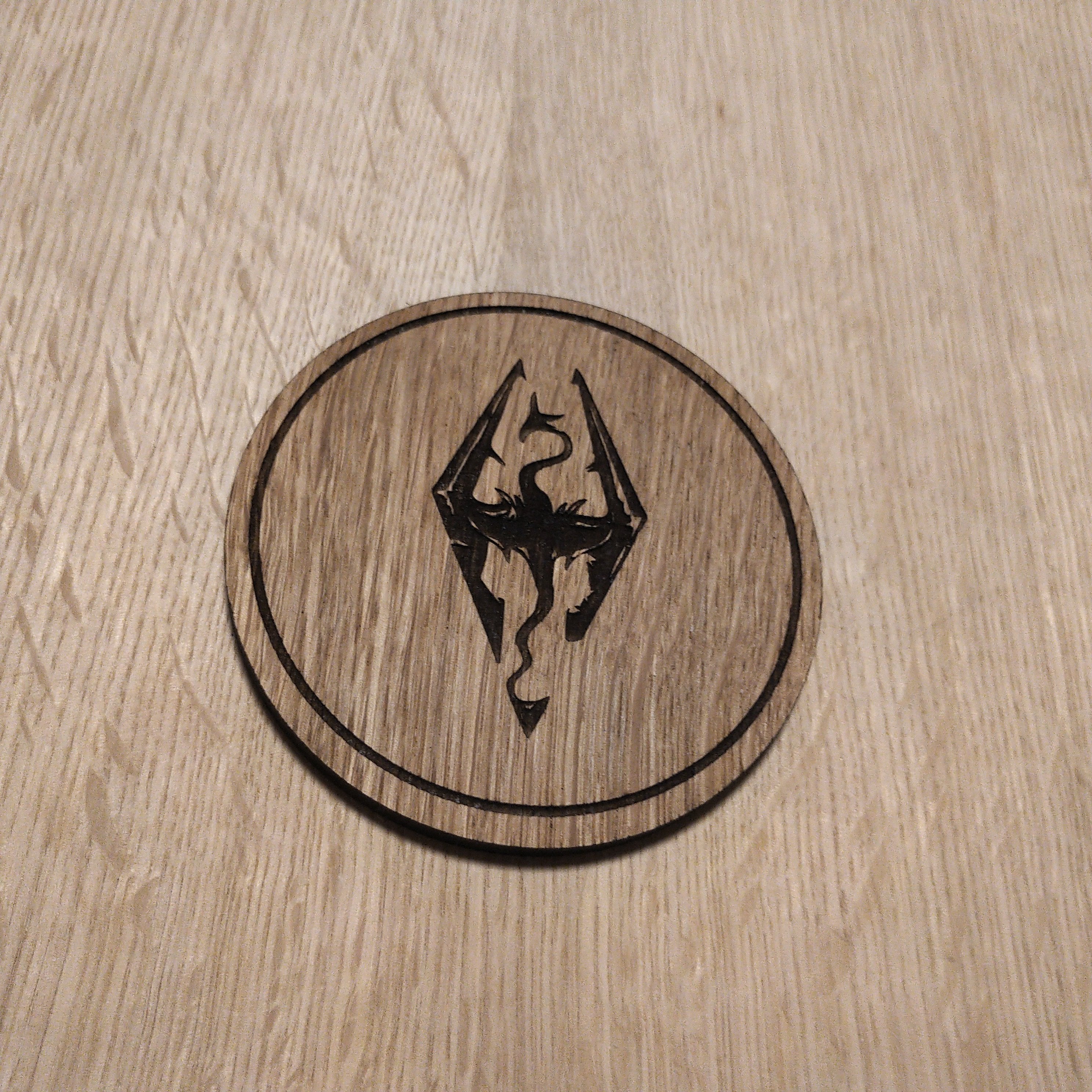 Laser cut wooden coaster. Dragon born Design