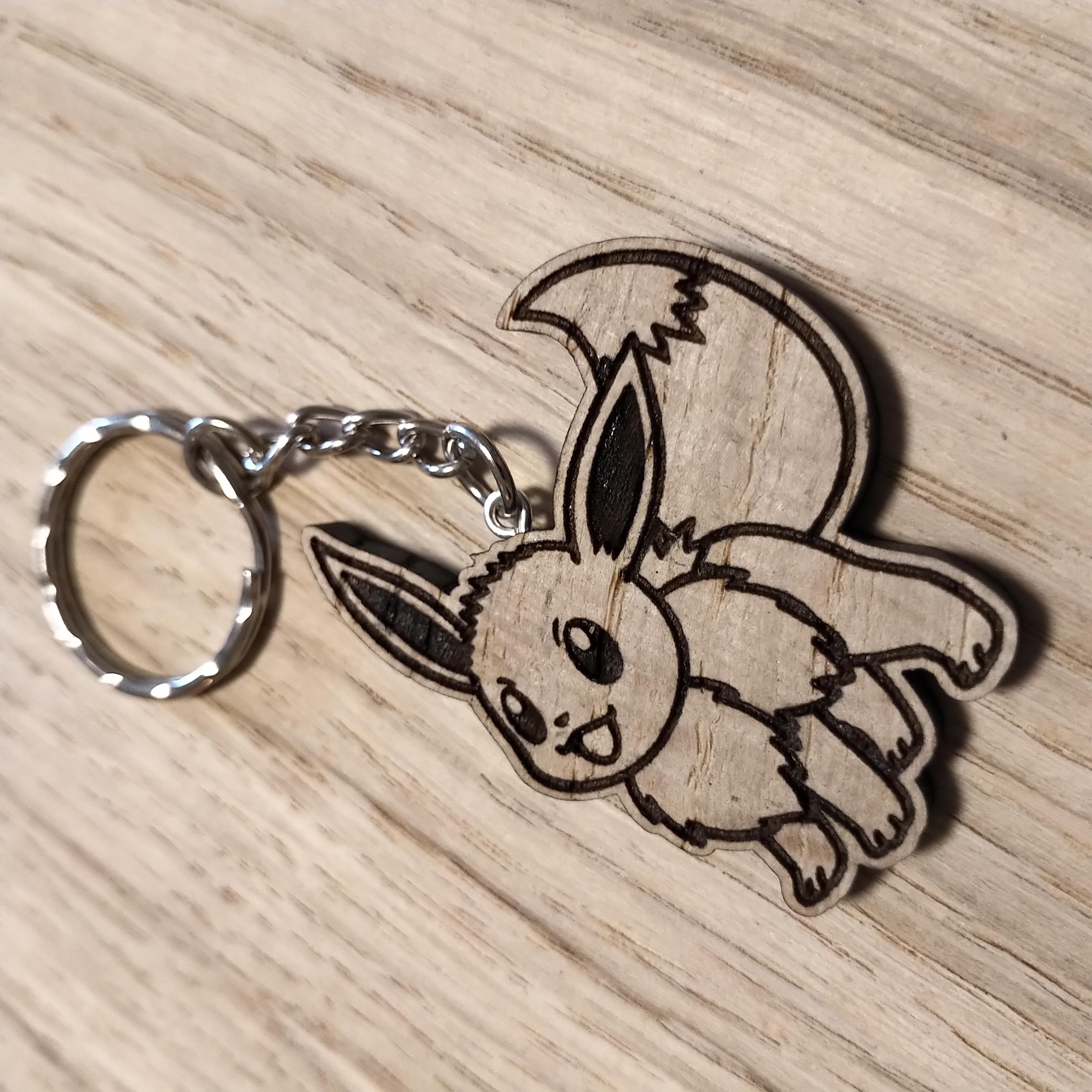 Lasercut wooden keyring keychain. Eevee