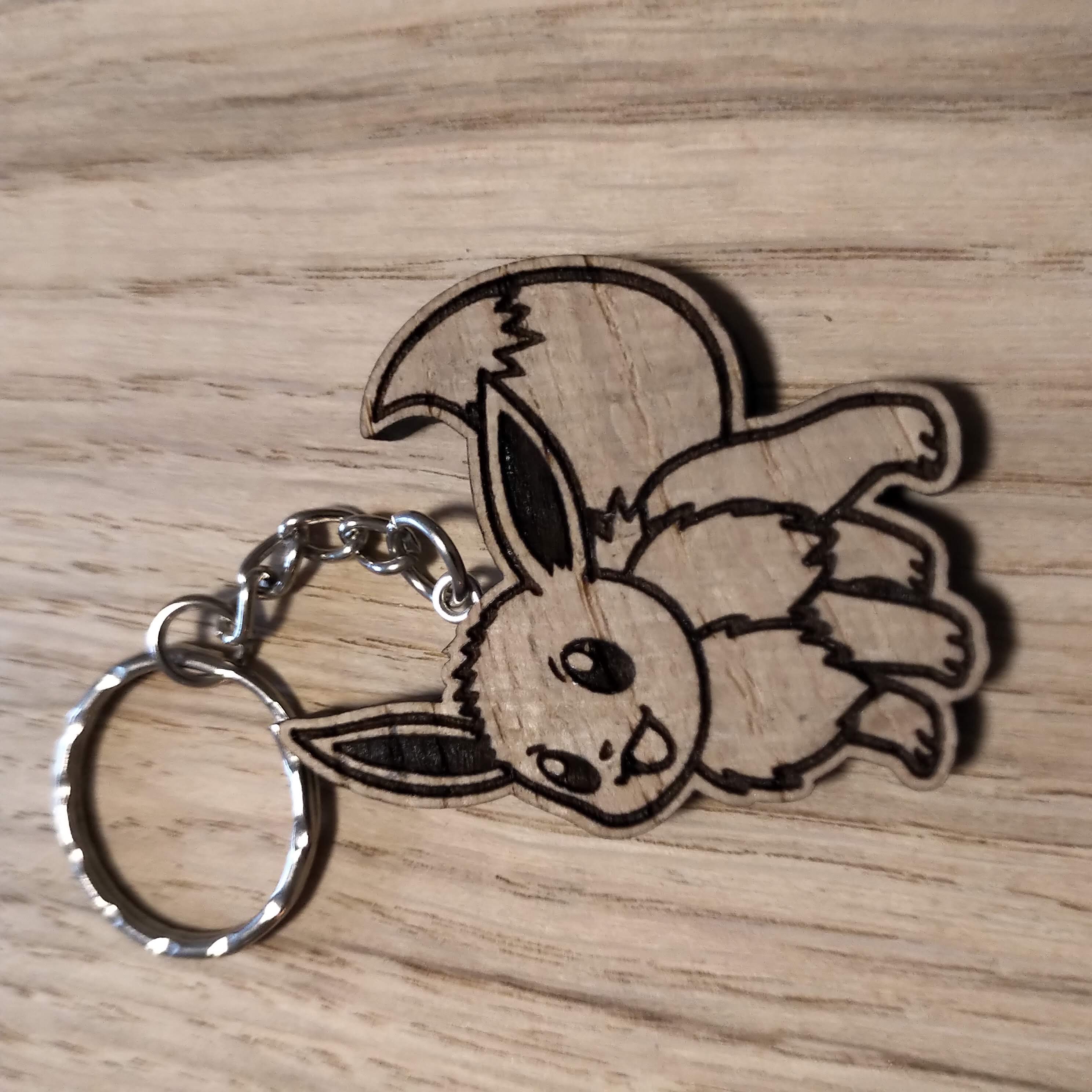 Lasercut wooden keyring keychain. Eevee
