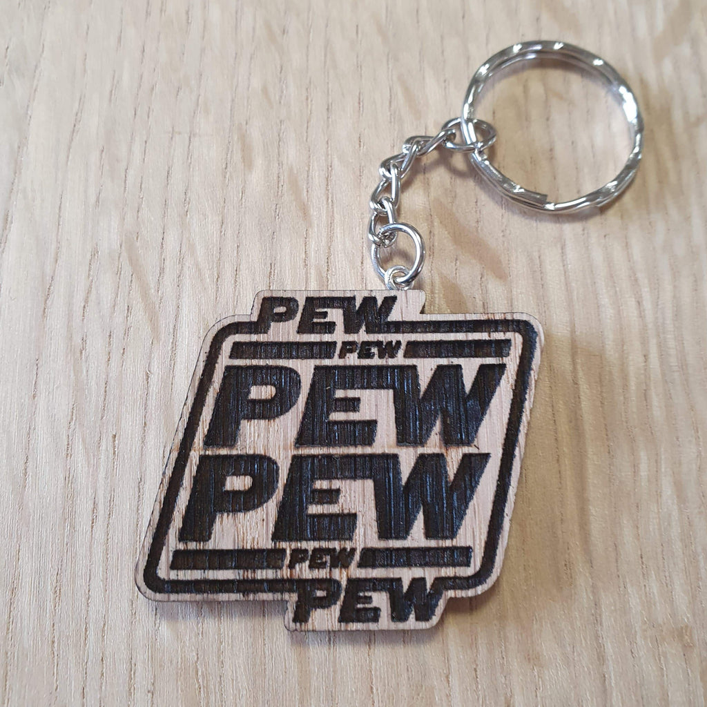 Lasercut wooden keyring keychain. Pew Pun