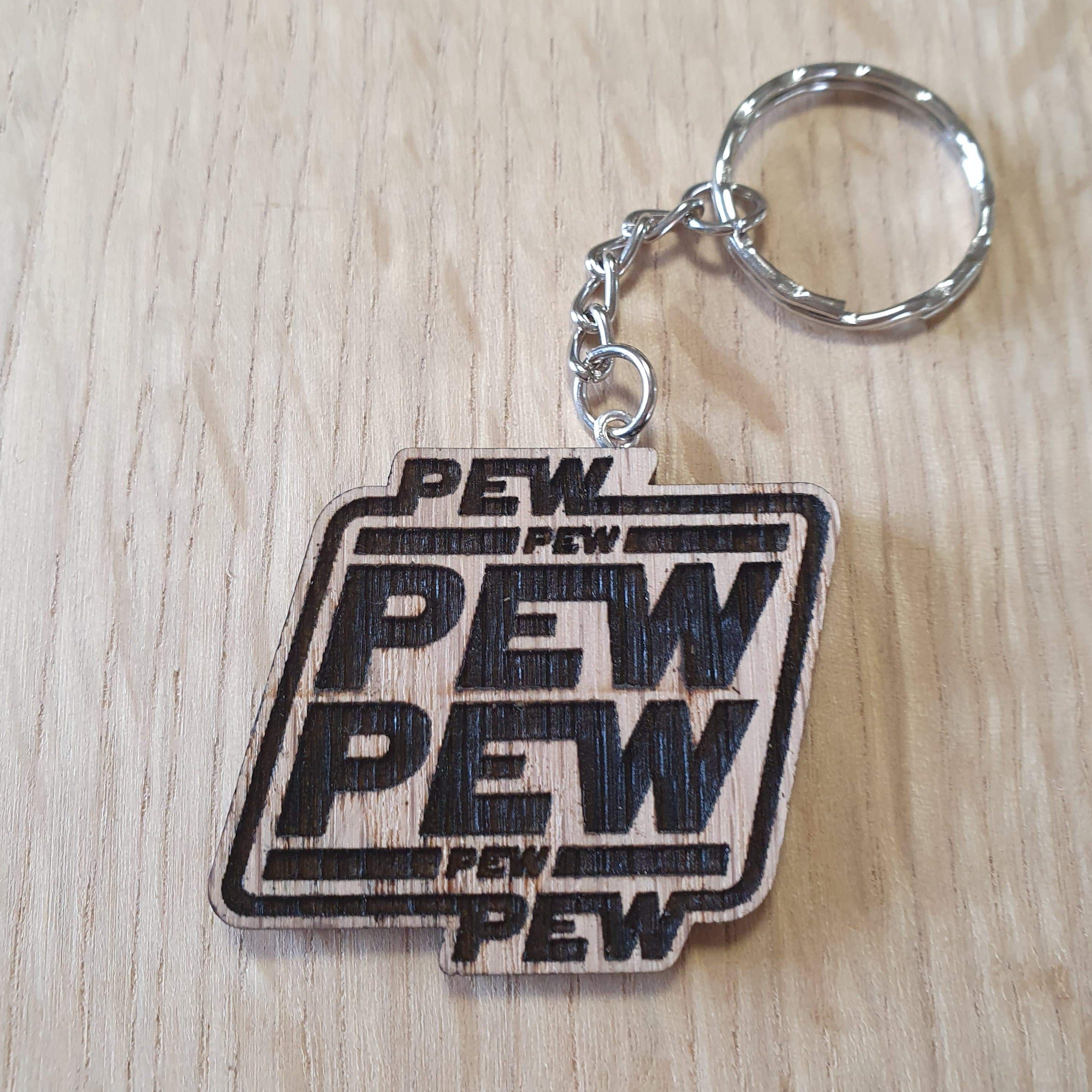 Lasercut wooden keyring keychain. Pew Pun
