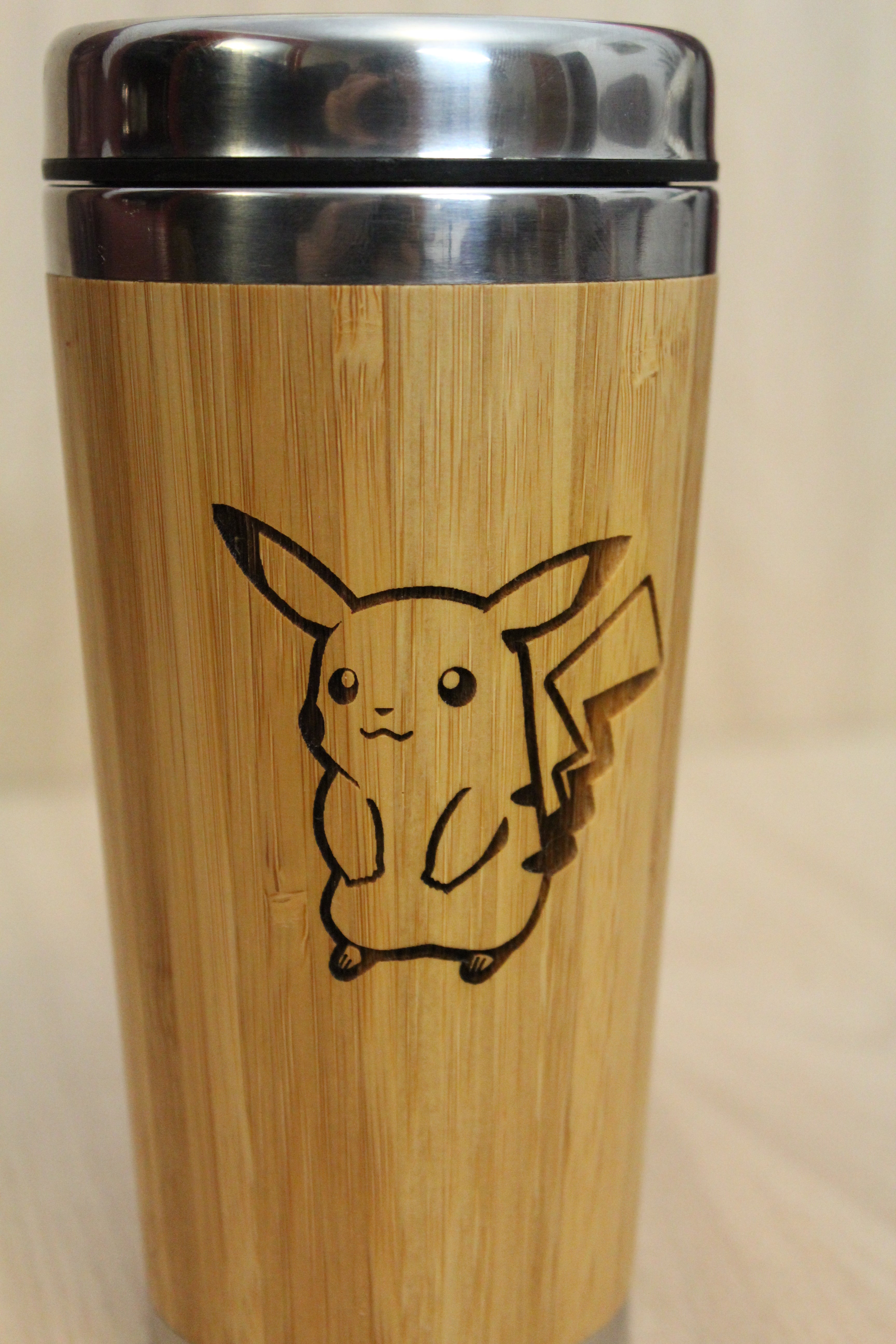 Lasercut Travel Mug   - S-Steel with 100% Bamboo exterior - pika