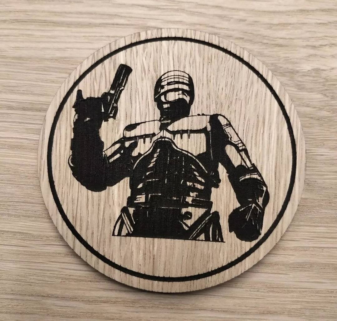 Laser cut wooden coaster. Futuristic robot cop Robocop 1980s fan art - Unique Gift lasercut